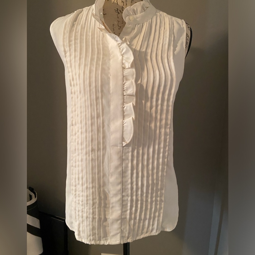 Ann Taylor ruffle blouse size medium cream color